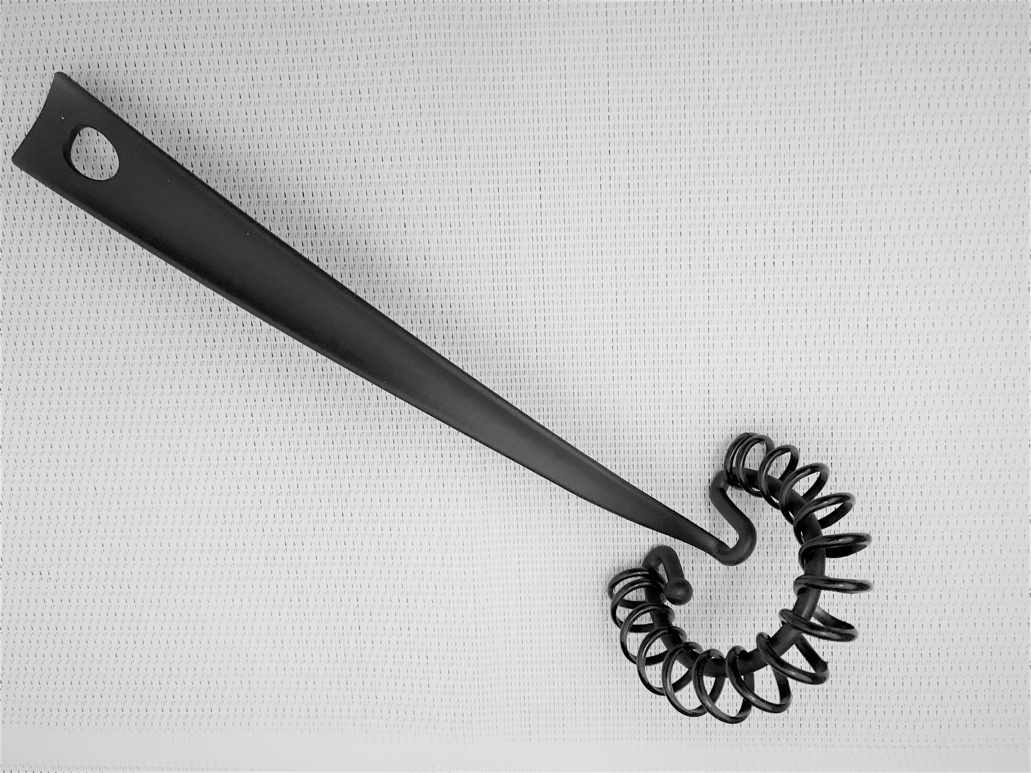 Eksempel på god kontrast: sort visp på hvit bakgrunn.